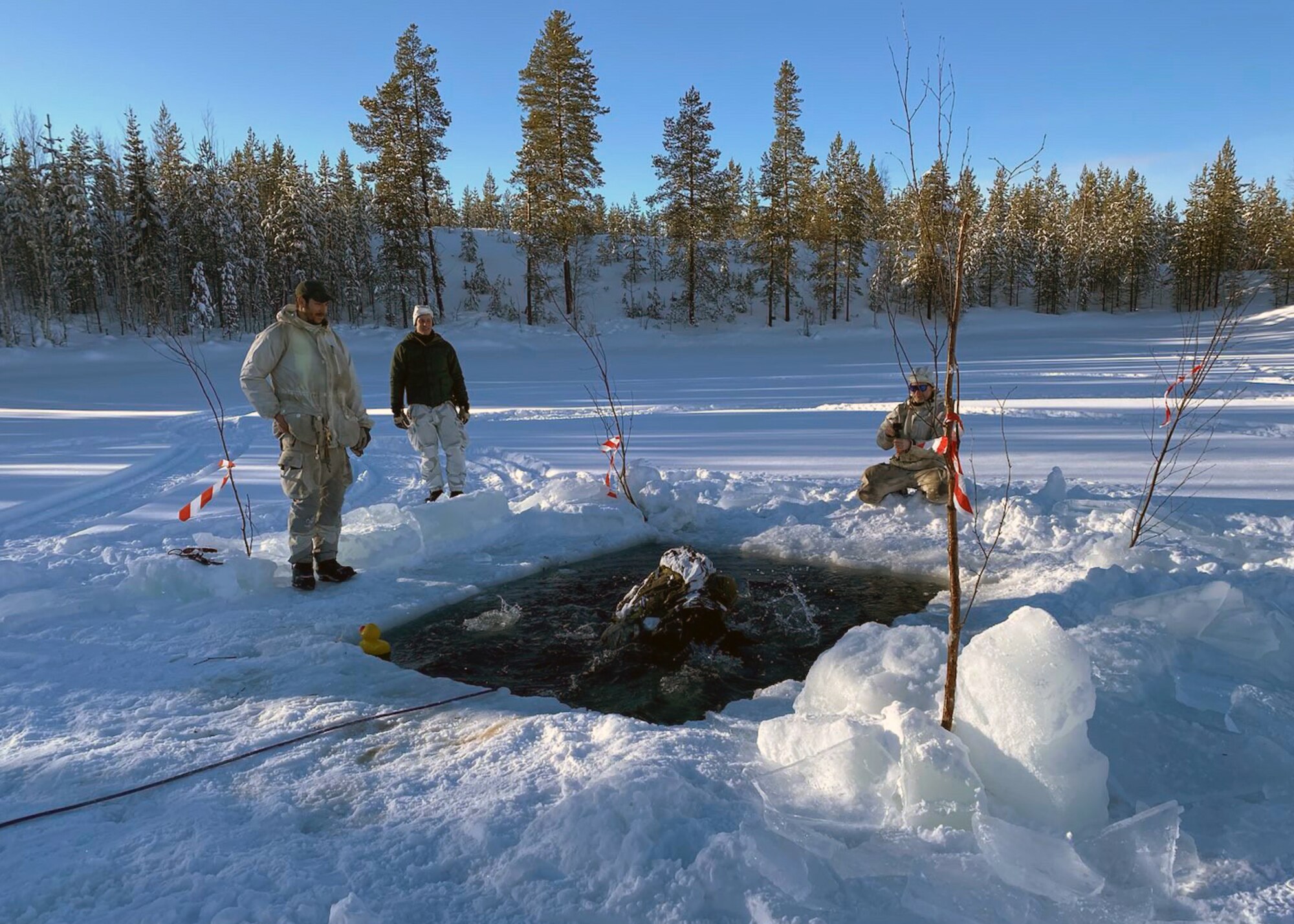 Staff Sgt. Zach Raines, 57th Rescue Squadron pararescue, completes cold weather training in King Bore’s Ice Bath