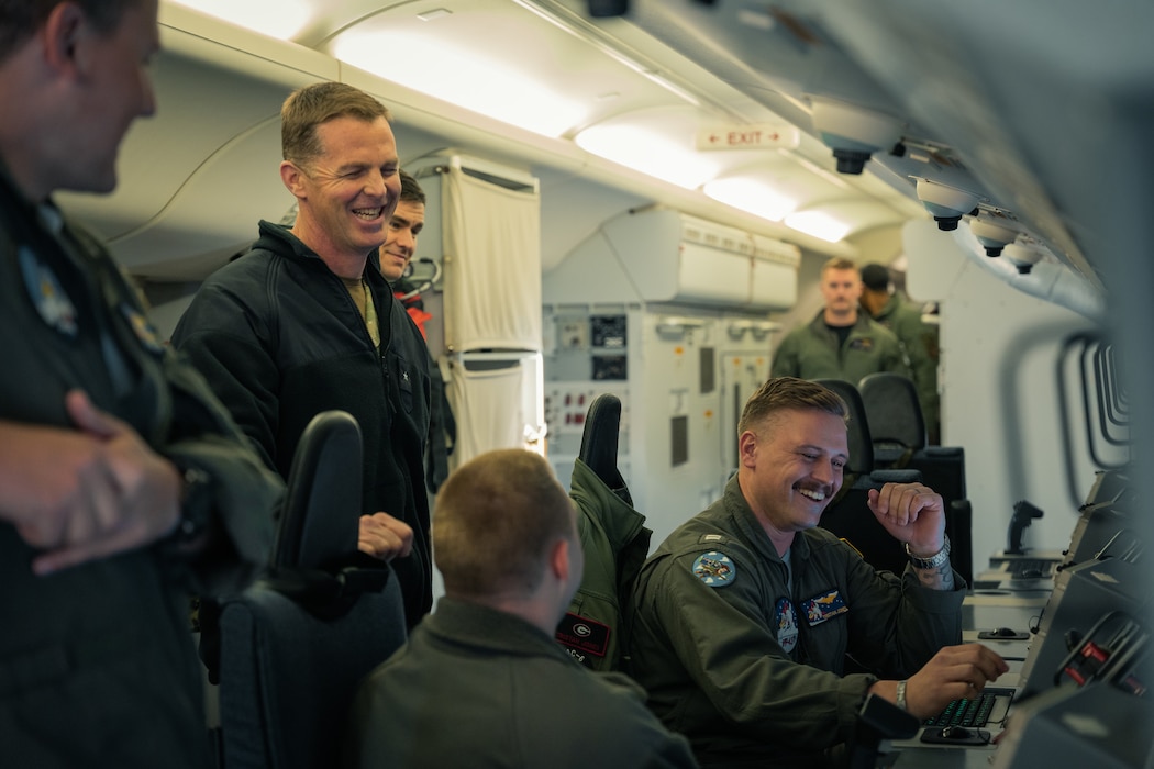 VP-45 Sailors laughing inside aircraft cabin