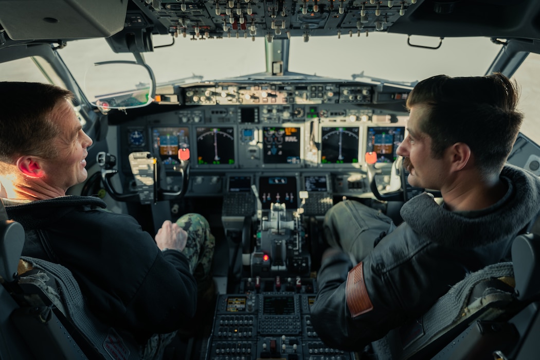 Sailors in a VP-45 aircraft cockpit