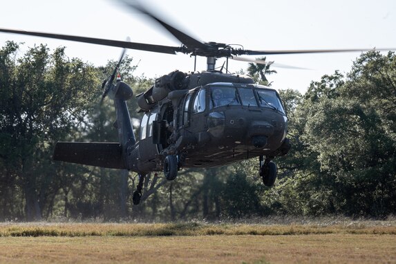 Army Reserve conduct rappel training onboard UH-60 Blackhawk