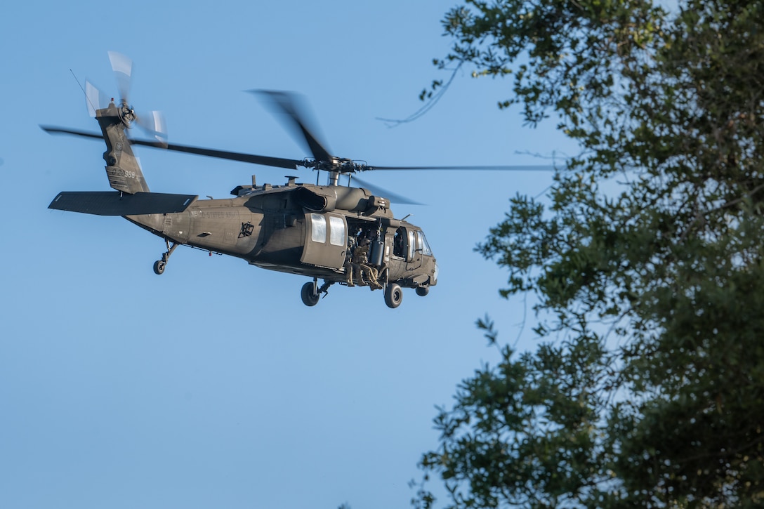 Army Reserve conduct rappel training onboard UH-60 Blackhawk