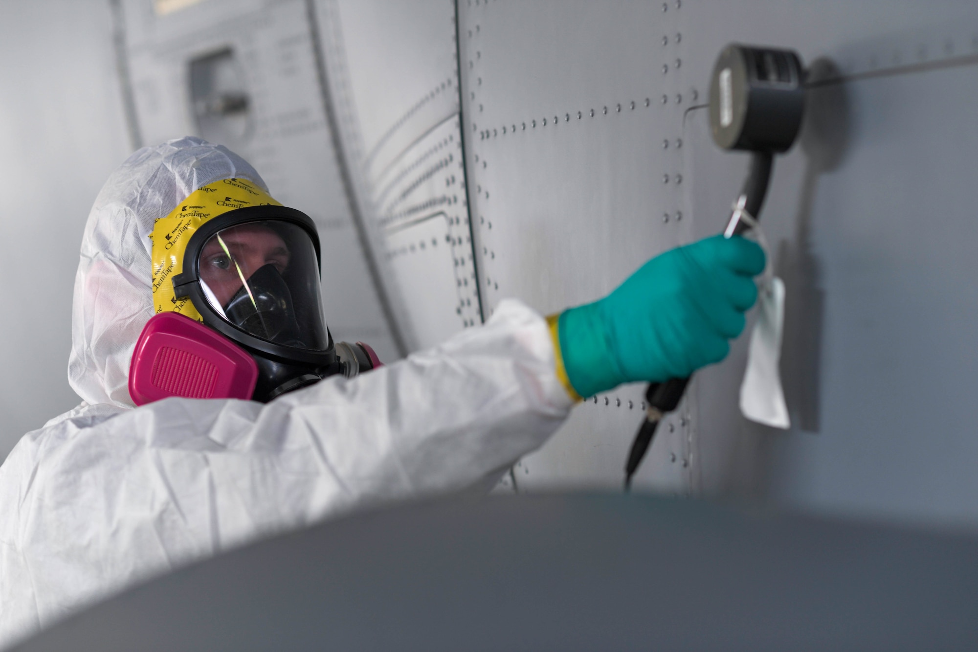 U.S. Air Force Staff Sgt. John Punger, 86th Operational Medical Readiness Squadron bioenvironmental craftsman, conducts decontamination safety procedures during exercise Radiant Falcon at Ramstein Air Base, Germany, March 16, 2023.