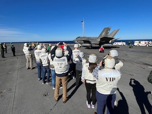 Eleven Congressional staff members from a variety of offices on Capitol Hill observe Carrier Qualifications conducted by Strike Fighter Squadron (VFA) 125 and VFA-147 aboard USS Carl Vinson (CVN 70). The Navy Office of Legislative Affairs executes Staff Delegations to provide Congressional staff a unique opportunity to see naval operations and to interact with Sailors.