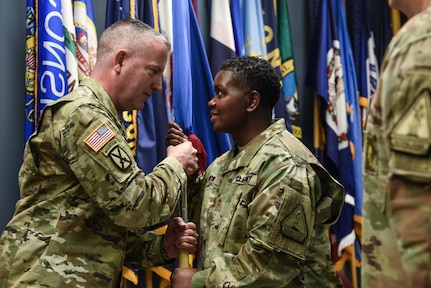 Maj. Kim D. Wynn takes command of the Virginia Army National Guard’s Fort Pickett-based Recruiting and Retention Battalion from Lt. Col. Scott A. Nivens during a ceremony March 3, 2023, at Fort Pickett, Virginia. Brig. Gen. K. Weedon Gallagher, Virginia National Guard Assistant Adjutant General - Army, presided over the change of command ceremony and the exchange of organizational colors signifying the transfer of command from Nivens to Wynn. (U.S. National Guard photo by Sgt. 1st Class Terra C. Gatti)