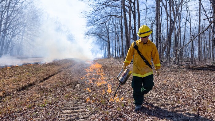 Mark Blake, Quantico Fire & Emergency Services, conducts controlled burns at Marine Corps Base Quantico, Virginia, March 9, 2023. According to the NREA, the purpose of the burns is to reduce fuel litter, minimize the potential of wildfires, and promote wildlife habitat. Fuel litter is dead and trodden woody debris that could be used as fuel for wildfires or other potential hazards.



In addition, excess foliage can disrupt the natural flow of nutrients throughout the soil and ecosystem as a whole. The burns are carried out multiple times throughout the year to achieve maximum results. Other benefits of conducting the controlled burns include the mitigation of pests and diseases, native plant reduction, and control of invasive species.