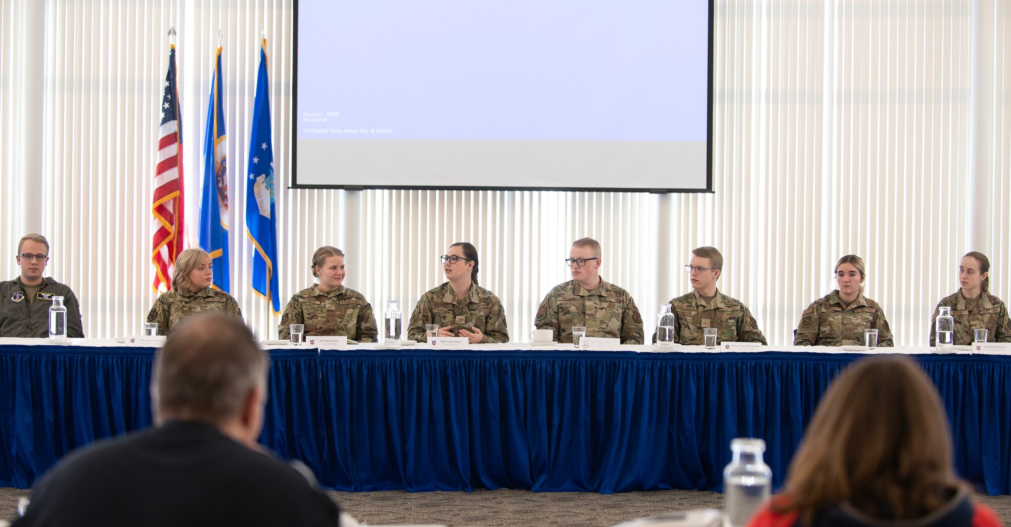 U.S. Air Force Airmen from the 133rd Airlift Wing talk to educators in St. Paul, Minn., March 12, 2023.