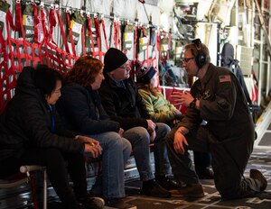 Steven Rosenfledt, left, talks with U.S. Air Force Senior Airman Erika Gregory, 133rd Operations Squadron, over the skies of Minnesota, March 12, 2023.
