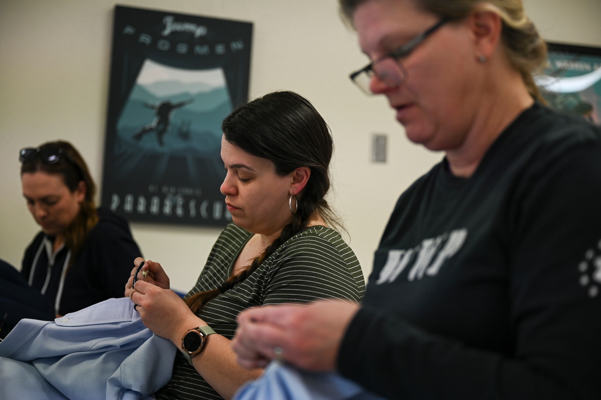 A group of women sew.