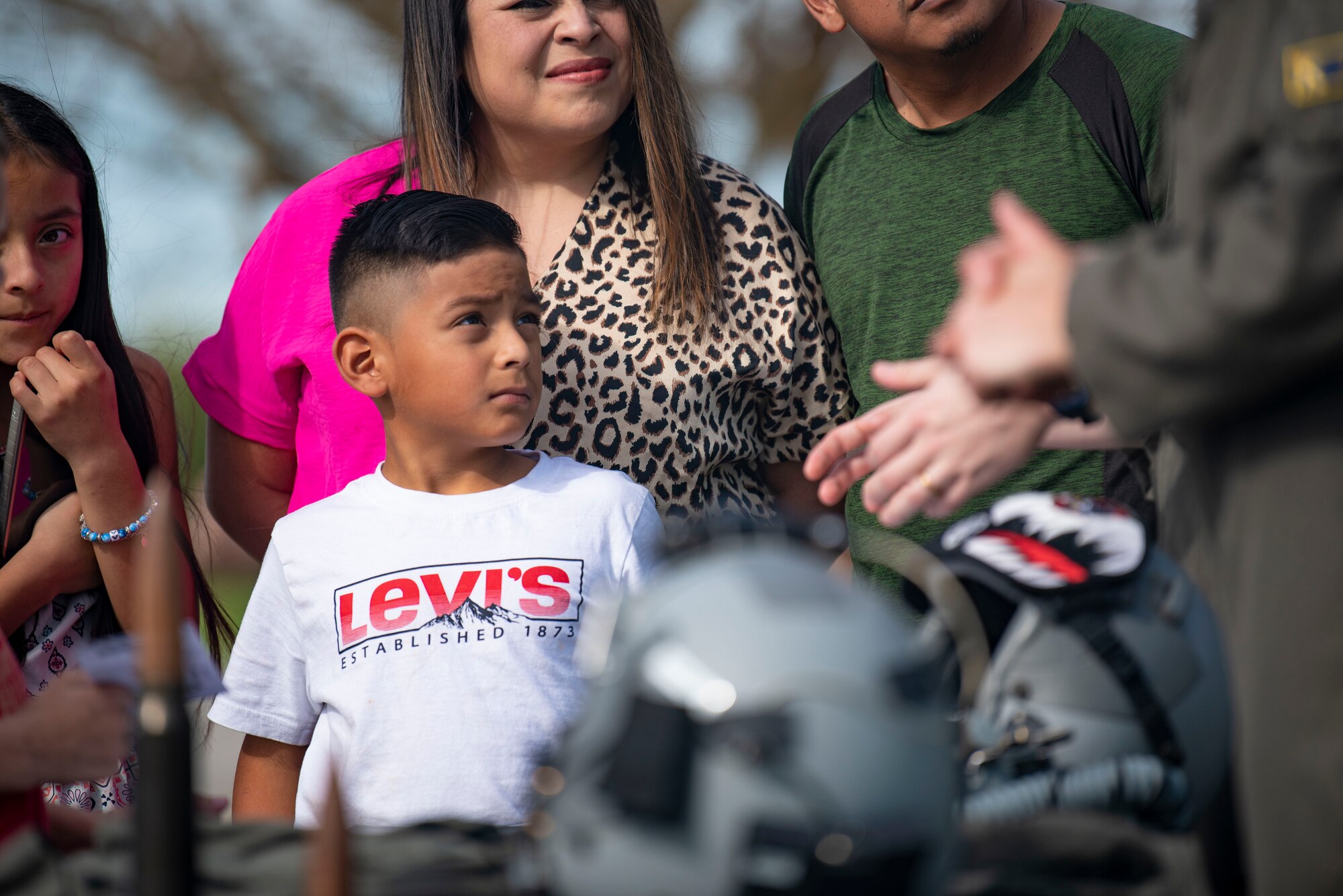 A young attendee listens to Airmen from Moody Air Force Base during the Youth Flight Experience event at Fitzgerald, Georgia, March 4, 2023. Airmen from Moody AFB educated local children and students on opportunities in the aviation career field. (U.S. Air Force photo by Staff Sgt. Thomas Johns)