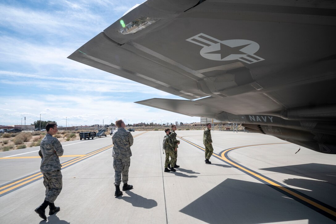 Civil Air Patrol and United States Naval sea cadets receive an up close and personal look at a Navy VX-9 F-35C during a tour of Edwards Air Force Base hosted by the Air Force Operational Test and Evaluation Center Detachment 5, March 17.