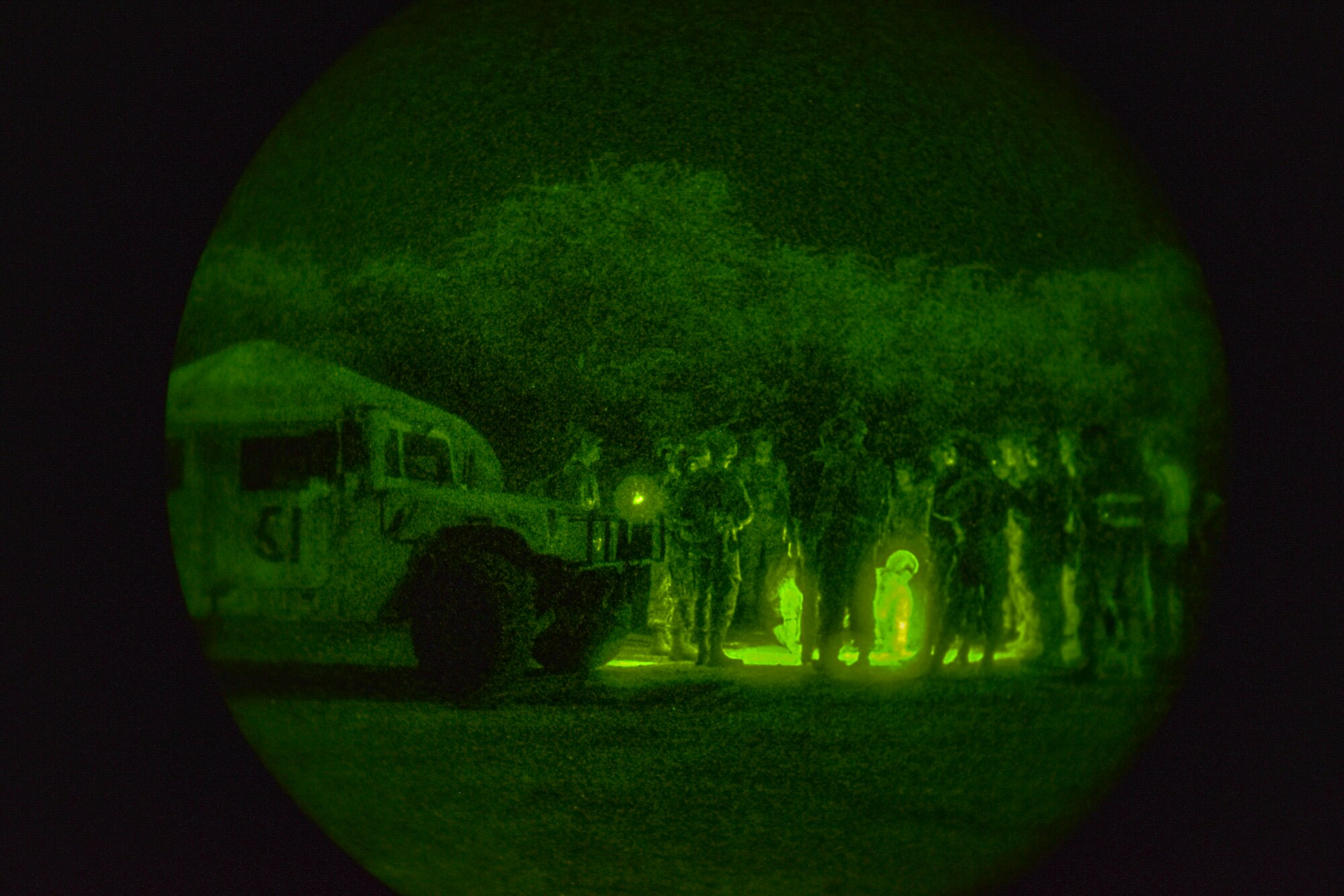 Airmen assigned to the 647th Security Forces Squadron prepare for a night mission to secure, protect and defend a forward operating base at Joint Base Pearl Harbor-Hickam, Hawaii, during the Joint Base Readiness Exercise, Mar. 6, 2023. The 15th Wing’s ability to surge combat-ready forces across the theater is critical to supporting regional alliances, partnerships and stability. (U.S. Air Force photo by Tech. Sgt. Anthony Nelson Jr.)
