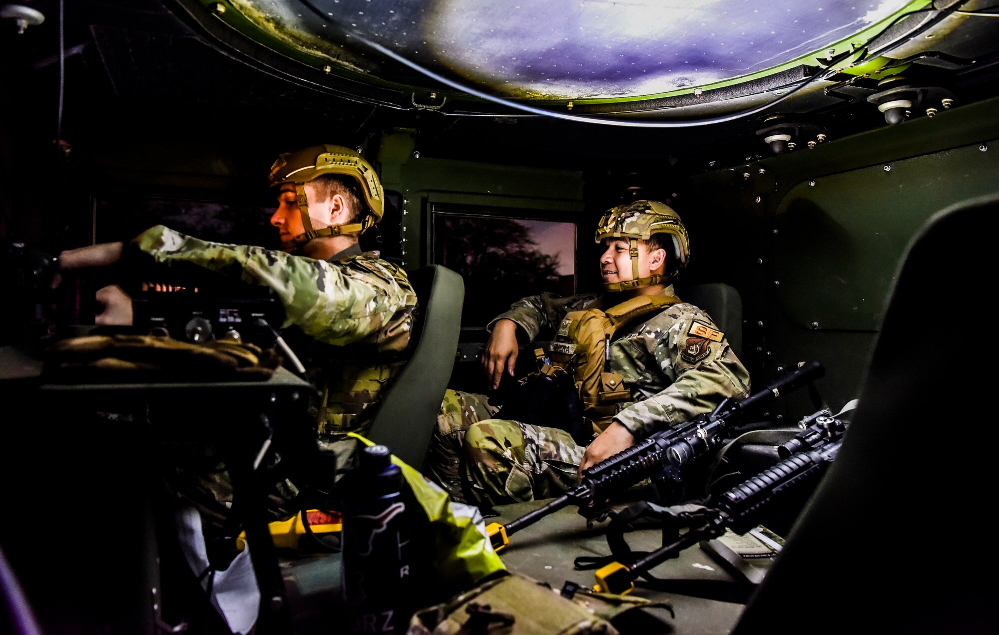 647th Security Forces Squadron Airmen prepare to go on patrol during a night mission at a forward operating base at Joint Base Pearl Harbor-Hickam, Hawaii, during the Joint Base Readiness Exercise, Mar. 6, 2023. JBRE will evaluate the 15th Wing’s capability to survive and operate in high threat deployed areas by assessing capabilities such as Multi-Capable Airmen operations, the execution of Agile Combat Employment concepts, aircraft generation, mass casualty response. (U.S. Air Force photo by Tech. Sgt. Anthony Nelson Jr.)