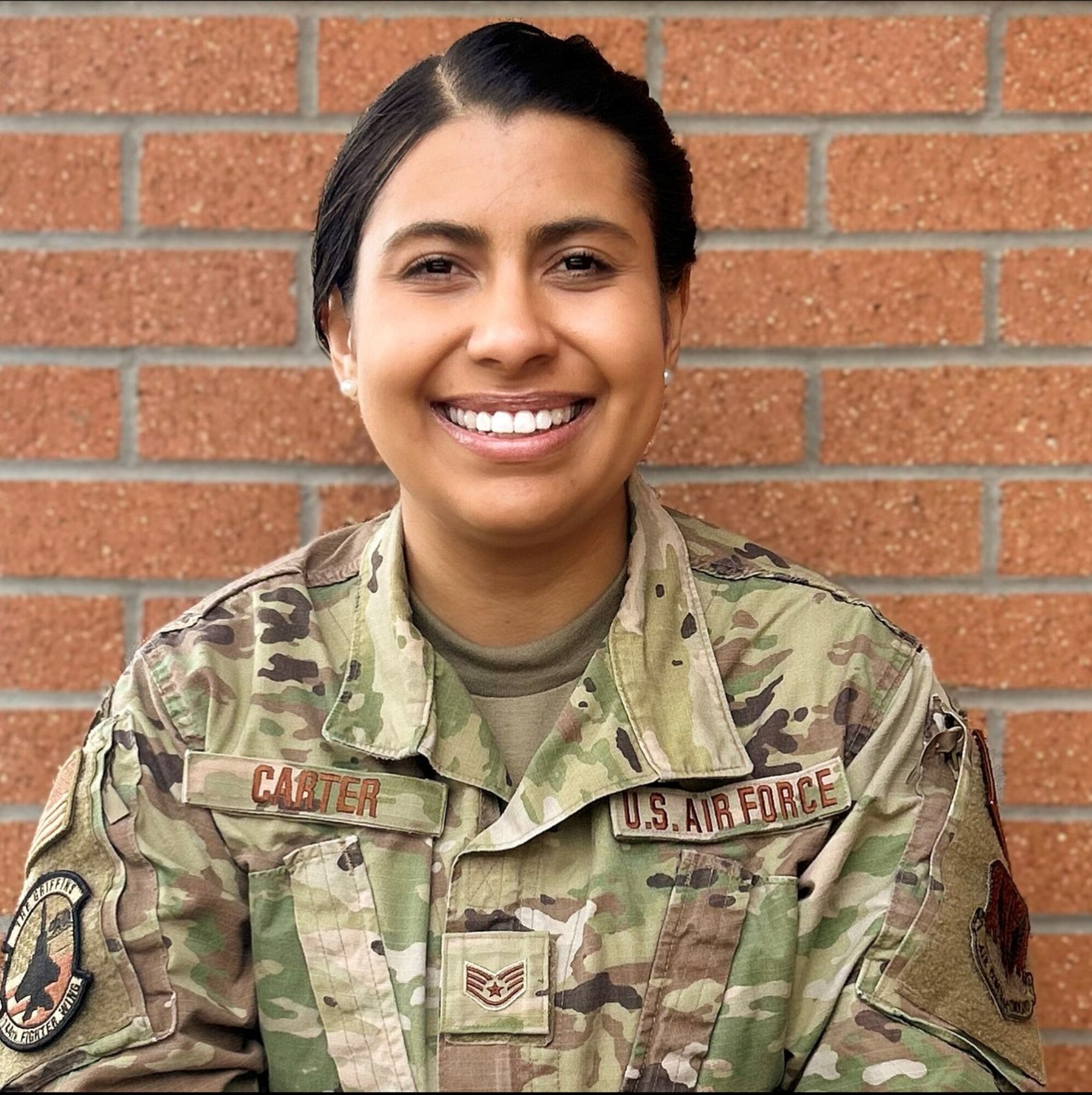 Staff Sgt. LoRainna Carter smiles for a photo.