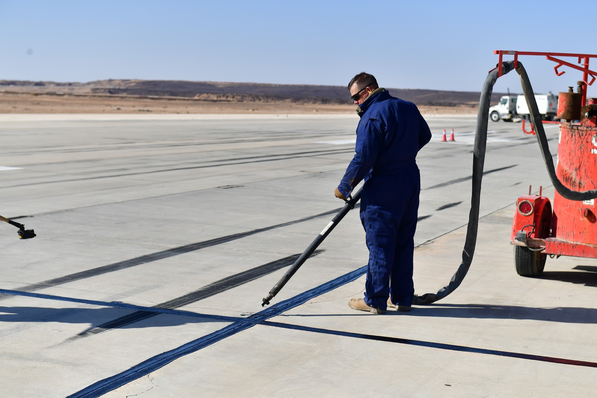 When a 130,000 pound aircraft touches down, it makes an impact. And no matter how good your surface is, over time, everything wears down. So when the 332d Air Expeditionary Wing starts to see cracks in the flight line, they call the 332d Expeditionary Civil Engineer heavy repair flight.