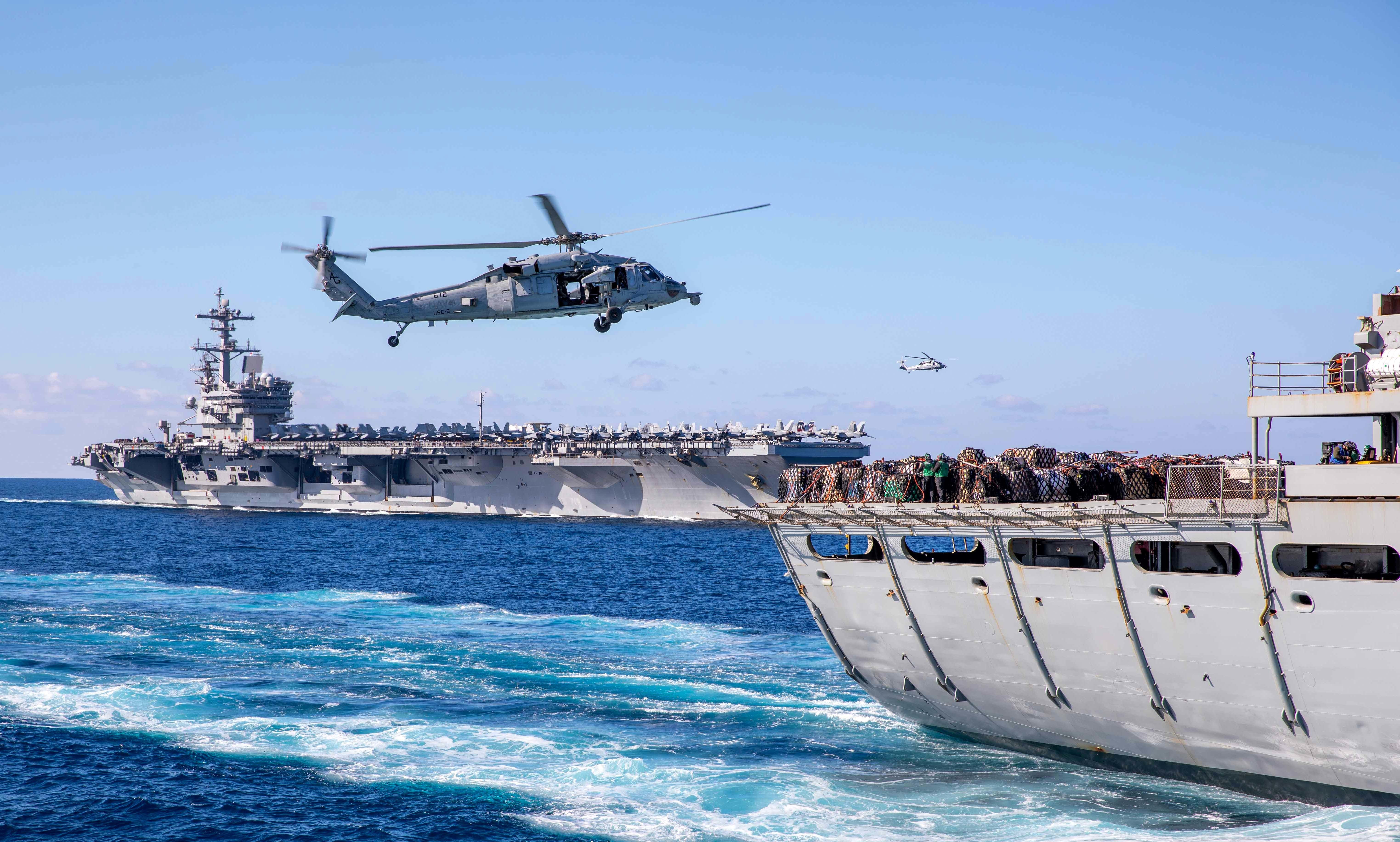 USS George H.W. Bush (CVN 77) replenishes from USNS Arctic (T-AOE 8).