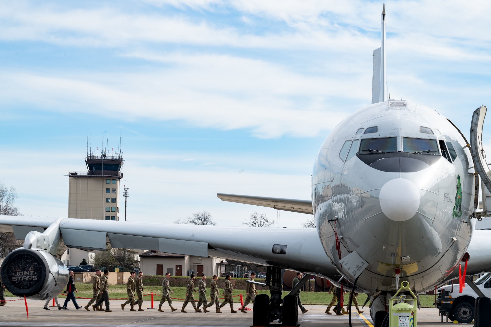 people walk to aircraft