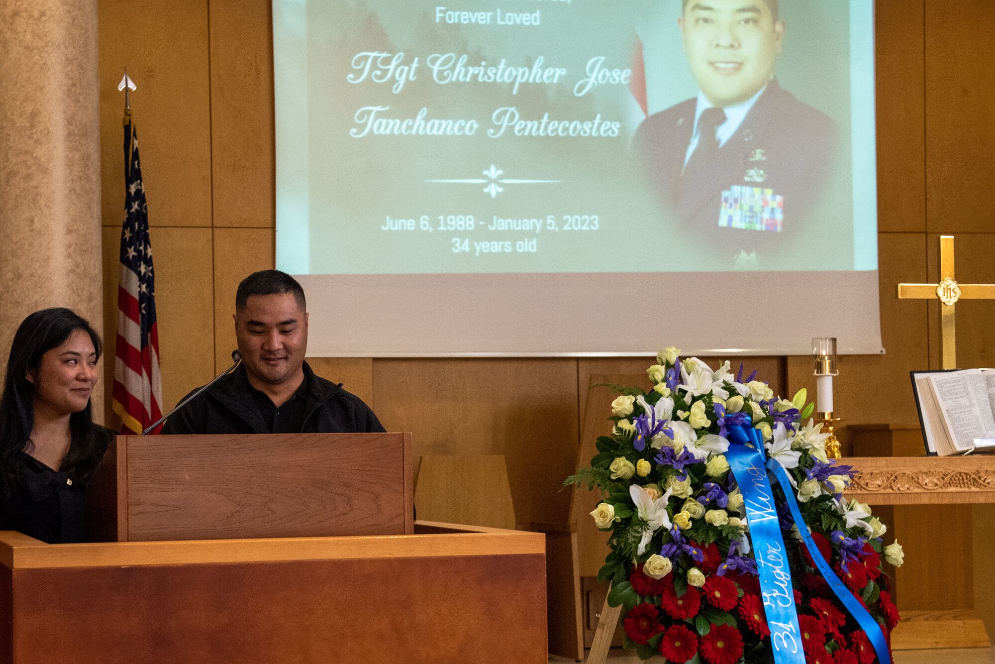 The family of Tech. Sgt. Christopher “Penny” Pentecostes speaks at the memorial ceremony dedicated to his memory