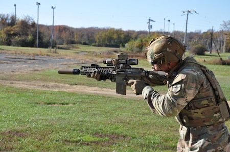 A Soldier fires the unsuppressed Sig Sauer XM-7 Rifle with Vortex XM-157 Fire Control from the standing position during a controllability trial of the Next Generation Squad Weapons (NGSW) Production Soldier Tough Point (STP) #1 at Aberdeen Proving Ground, MD, in November 2022.