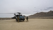 Brigadier General Charlene Dalto, land component commander, and Command Team observe a live-fire aerial gunnery training exercise with 1st Attack Battalion, 211th Aviation Regiment, at the Utah Test and Training Range by Barro, Utah, Mar. 14, 2023. This training event was in preparation for the Joint Readiness Training Center (JRTC), in Fort Polk, Louisiana. (U.S. Army National Guard Photo by Staff Sgt. Cambrin Bassett)