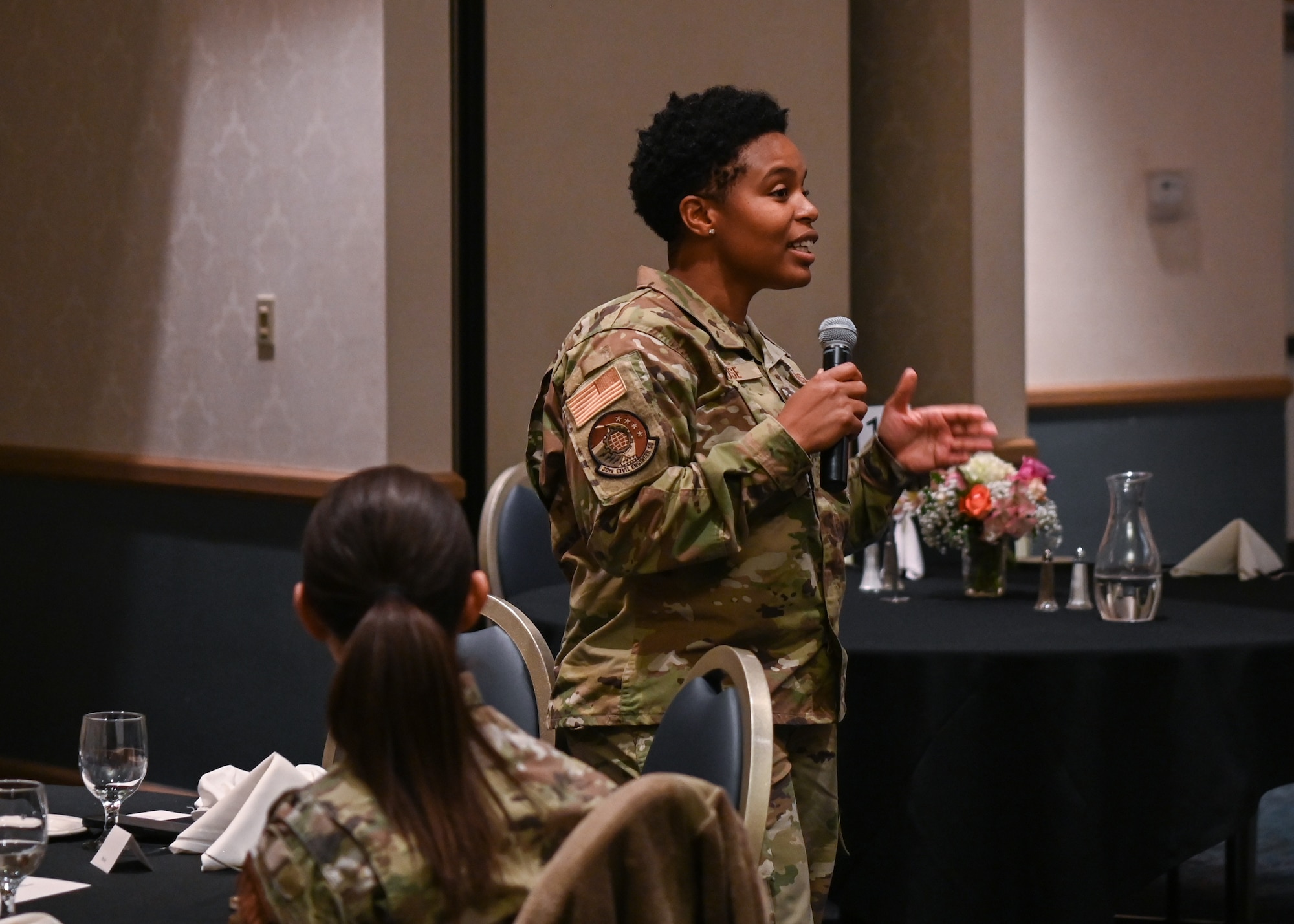 Senior Master Sgt. Asua Rose, 30th Civil Engineering Squadron engineering flight squadron superintendent, speaks to the guests during the Women's History Month luncheon at Vandenberg Space Force Base, Calif., March 21, 2023. Throughout the luncheon several women from team Vandenberg shared their life and career stories with the audience. (U.S. Space Force photo by Senior Airman Tiarra Sibley)
