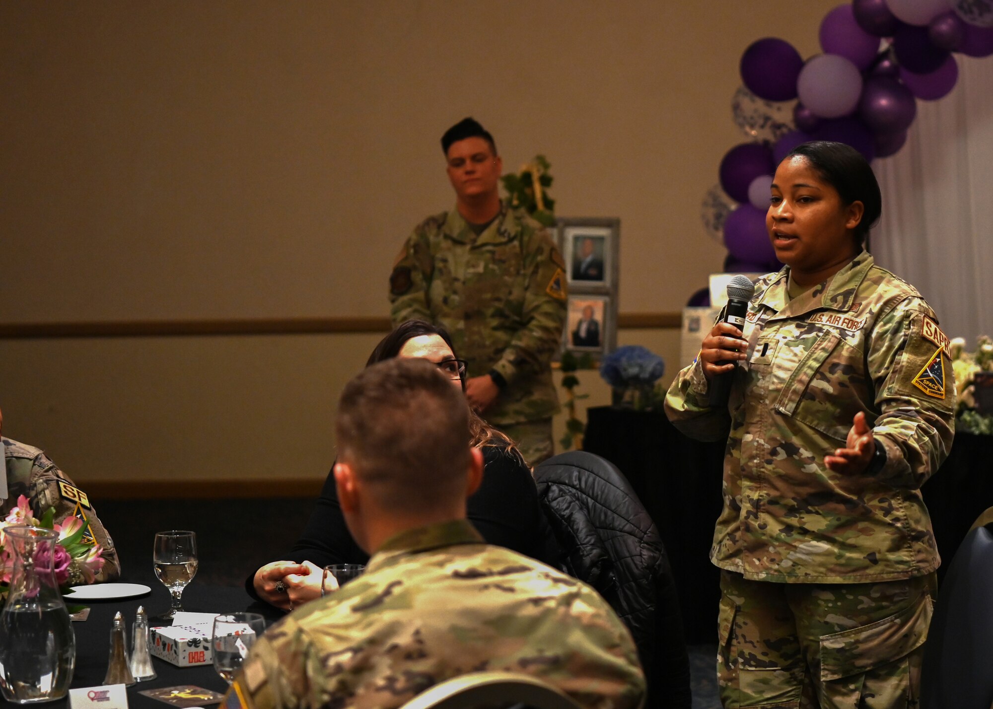 2nd Lt. Mone Ford, 30th Sexual Assault Prevention Response deputy sexual assault response coordinator, speaks to the guests during the Women's History Month luncheon at Vandenberg Space Force Base, Calif., March 21, 2023. The Vandenberg community came together to celebrate Women's History Month during a luncheon today at the Pacific Coast Club. (U.S. Space Force photo by Senior Airman Tiarra Sibley)