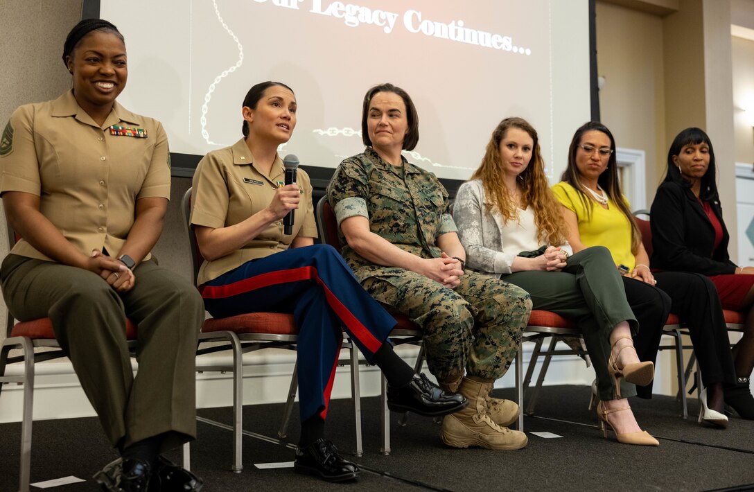 U.S. Marine Corps Maj. Heather Gruer, reserve diversity officer, Marine Corps Recruiting Command, answers a question for a Q & A session during the Decades of Growth event hosted at the Clubs of Quantico on Marine Corps Base Quantico, Virginia, March 17, 2023. The purpose of the event was for active duty service members, veterans, and civilians to hear the stories of the women have served and continue to serve to gain advice, experience, insight and knowledge. (U.S. Marine Corps Photo by Cpl. Mitchell Johnson)