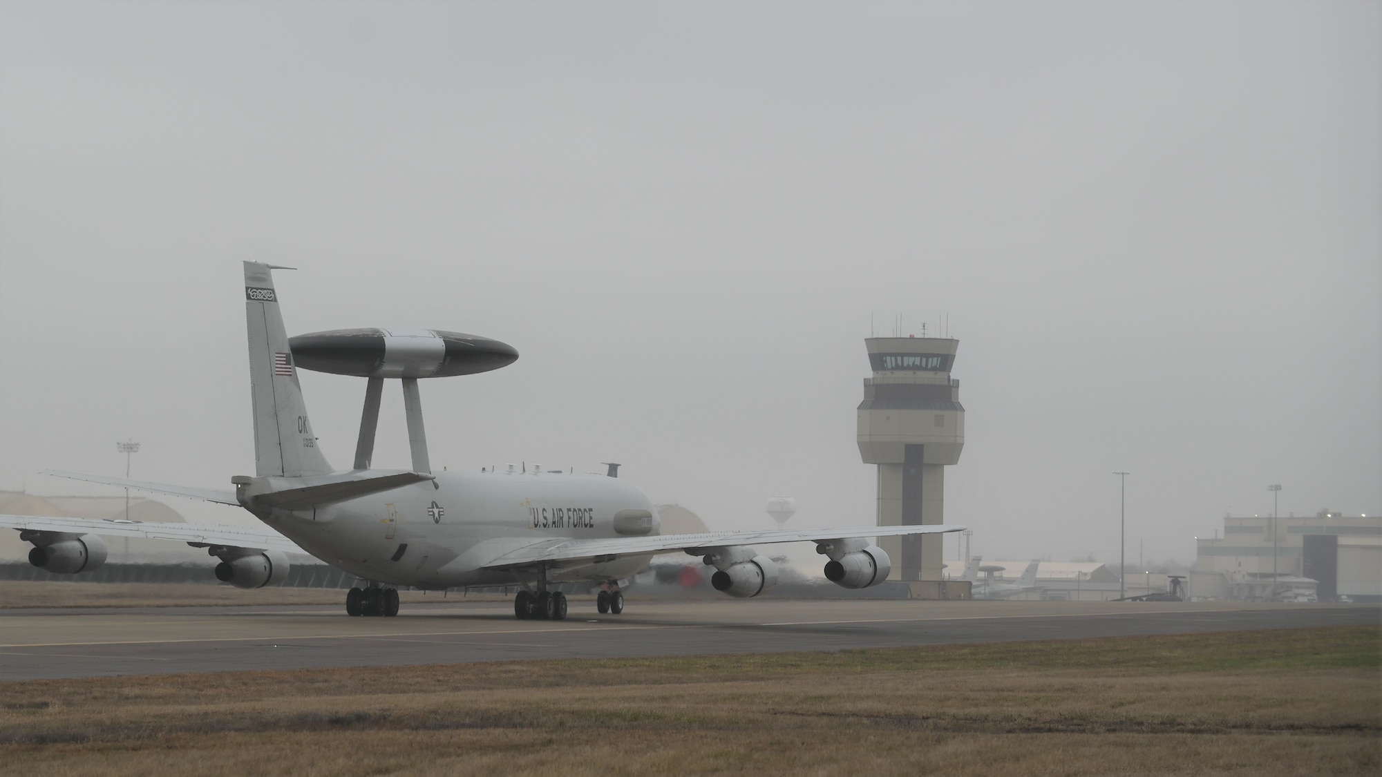 E-3 Sentry aircraft taxiing towards the tower.