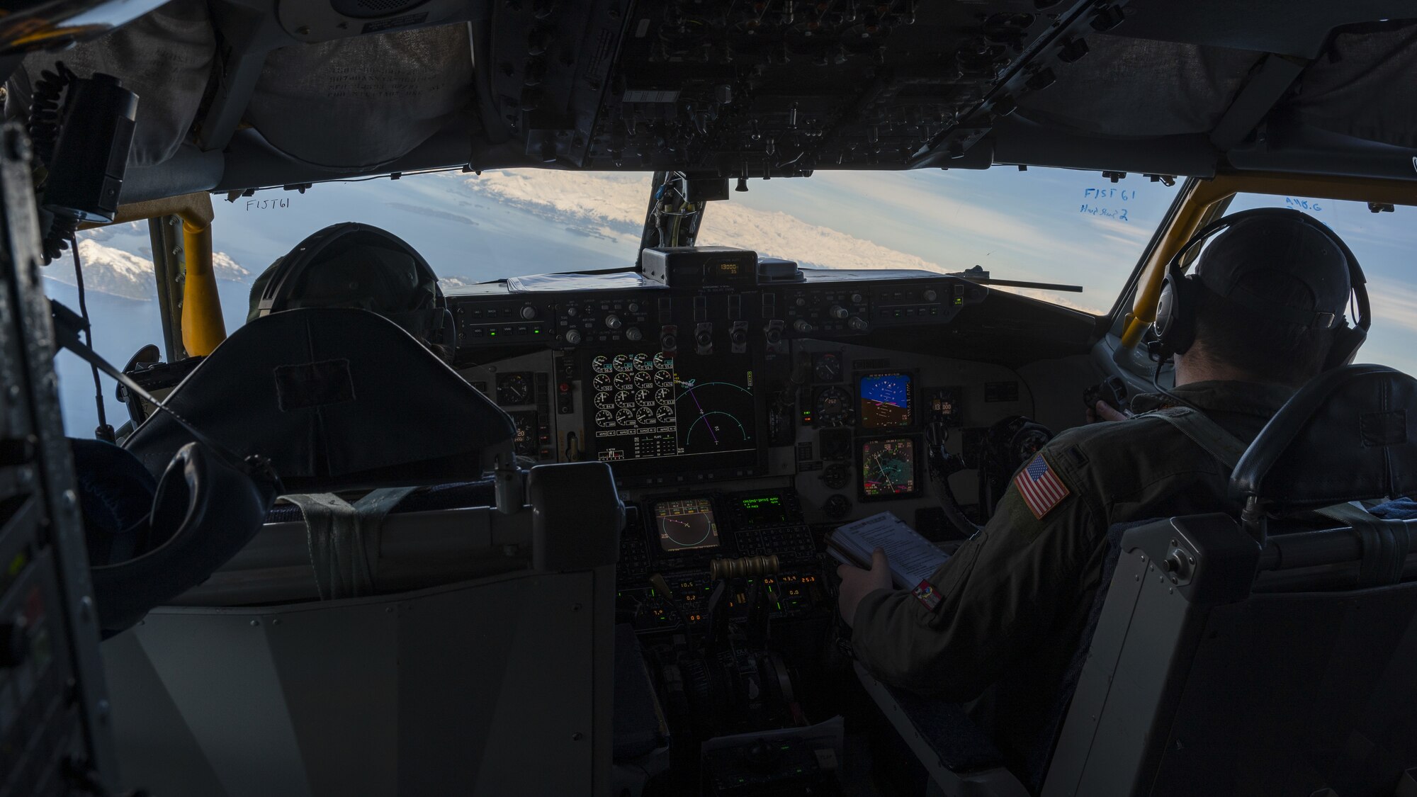 U.S. Air Force Capt. Christina Kelvin and 1st Lt. Jake McMullen, 384th Air Refueling Squadron pilots, prepare to land at Eielson Air Force Base, Alaska, March 7, 2023. Aircrew from the 384th Air Refueling Squadron conducted an air refueling coronet with Marines from the Marine Fighter Attack Squadron 312, demonstrating the critical role mobility forces have in projecting the joint force anywhere, anytime. (U.S. Air Force photo by Staff Sgt. Lawrence Sena)