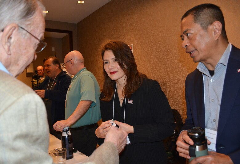 Pam Lovasz, chief of the U.S. Army Corps of Engineers Los Angeles District’s Engineering Division, center, and Van Crisostomo, assistant chief of the Corps’ LA District’s Engineering Division, right, help a potential contractor during the March 8 Business Opportunities Open House in Rosemead, California.