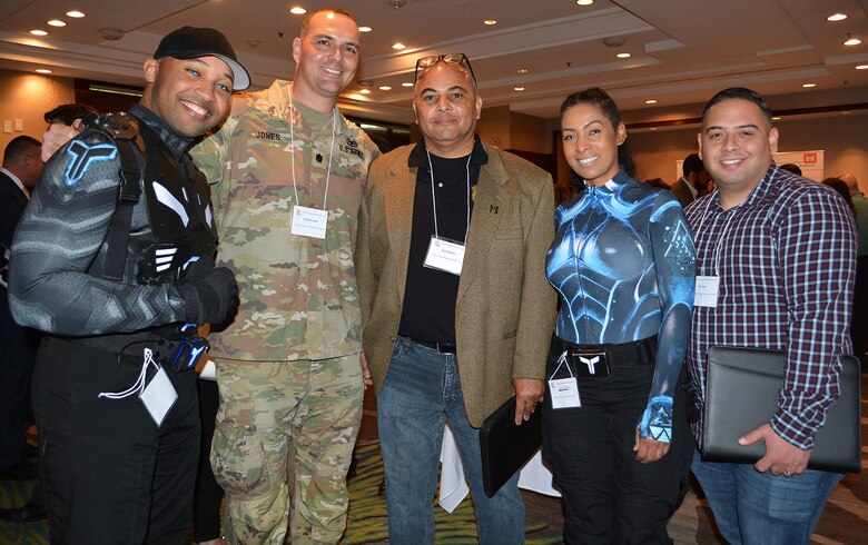 Lt. Col. Charlie Jones, contracting officer with the U.S. Army Corps of Engineers Los Angeles District, second from left, poses for a picture with, from left to right, Anthony Moore, Jones, Wayne Mackey, Catrina Moore and Raul Lopez, all with Mackey Training Advising Compliance, LLC, during the March 8 Business Opportunities Open House in Rosemead, California.