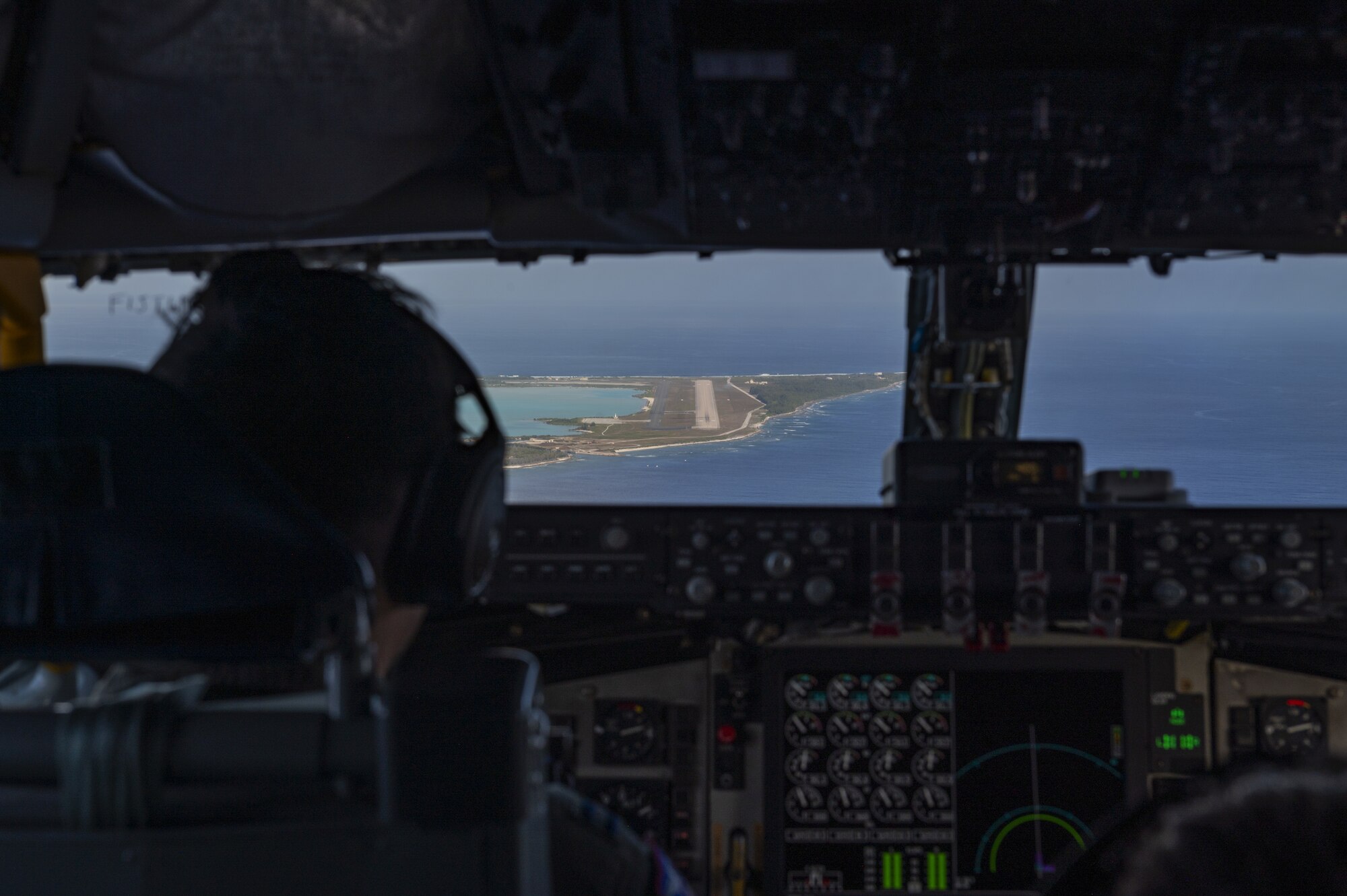 U.S. Air Force Capt. Jason Douglas, 384th Air Refueling Squadron pilot, prepares to land at Wake Island following an air refueling coronet mission with U.S. Marine Corps F/A-18C Hornets, March 9, 2023. Aircrew from the 384th Air Refueling Squadron conducted an air refueling coronet with Marines from the Marine Fighter Attack Squadron 312, demonstrating the critical role mobility forces have in projecting the joint force anywhere, anytime. (U.S. Air Force photo by Staff Sgt. Lawrence Sena)
