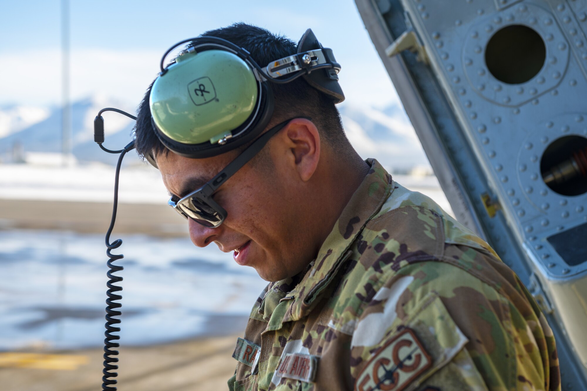 U.S. Air Force Tech. Sgt. Max Ramos, 92nd Aircraft Maintenance Squadron flying crew chief, prepares to perform a post-flight inspection following a mission at Eielson Air Force Base, Alaska, March 7, 2023. Aircrew from the 384th Air Refueling Squadron conducted an air refueling coronet with Marines from the Marine Fighter Attack Squadron 312, demonstrating the critical role mobility forces have in projecting the joint force anywhere, anytime. (U.S. Air Force photo by Staff Sgt. Lawrence Sena)