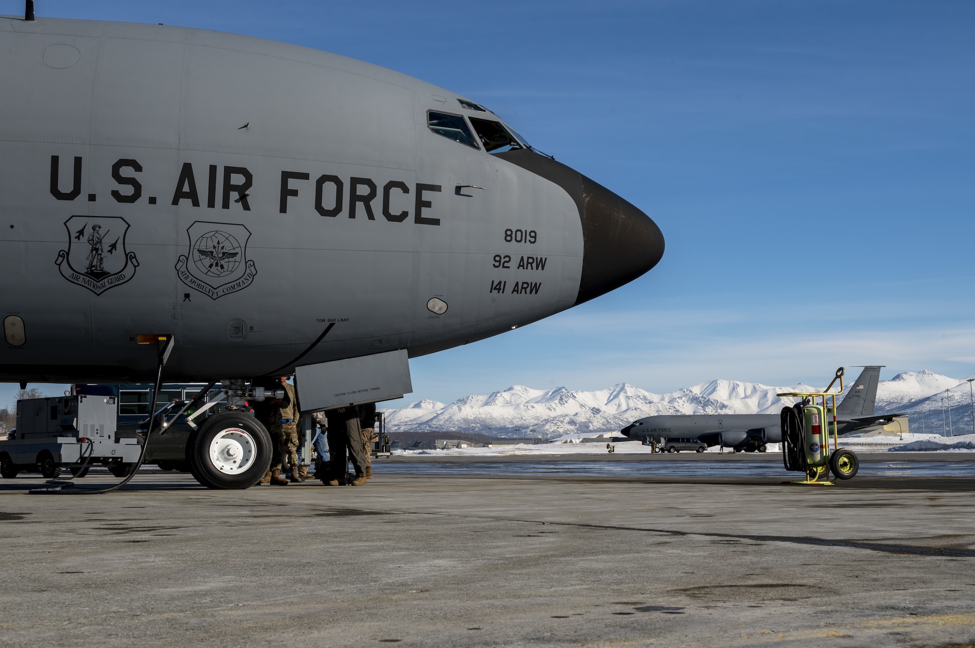 A U.S. Air Force KC-135 Stratotanker is parked on the flightline in preparation for a an air refueling coronet mission at Eielson Air Force Base, Alaska, March 7, 2023. Aircrew from the 384th Air Refueling Squadron conducted an air refueling coronet with Marines from the Marine Fighter Attack Squadron 312, demonstrating the critical role mobility forces have in projecting the joint force anywhere, anytime. (U.S. Air Force photo by Staff Sgt. Lawrence Sena)