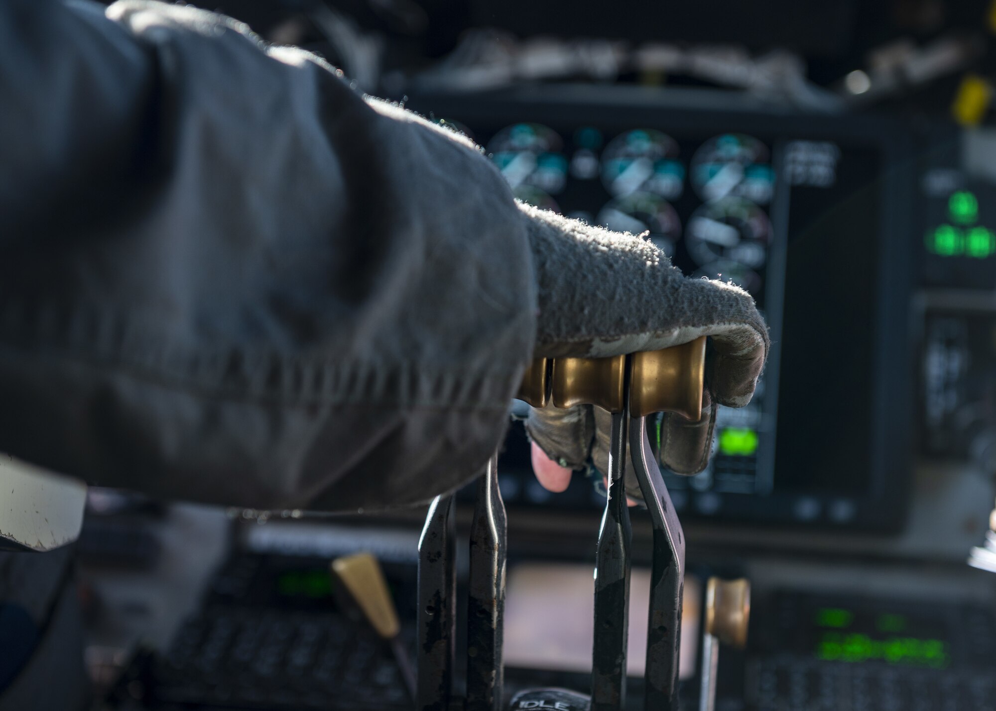U.S. Air Force Capt. Christina Kelvin, 384th Air Refueling Squadron pilot, flies a KC-135 Stratotanker en route to Eielson Air Force Base, Alaska, March 7, 2023. Aircrew from the 384th Air Refueling Squadron conducted an air refueling coronet with Marines from the Marine Fighter Attack Squadron 312, demonstrating the critical role mobility forces have in projecting the joint force anywhere, anytime. (U.S. Air Force photo by Staff Sgt. Lawrence Sena)