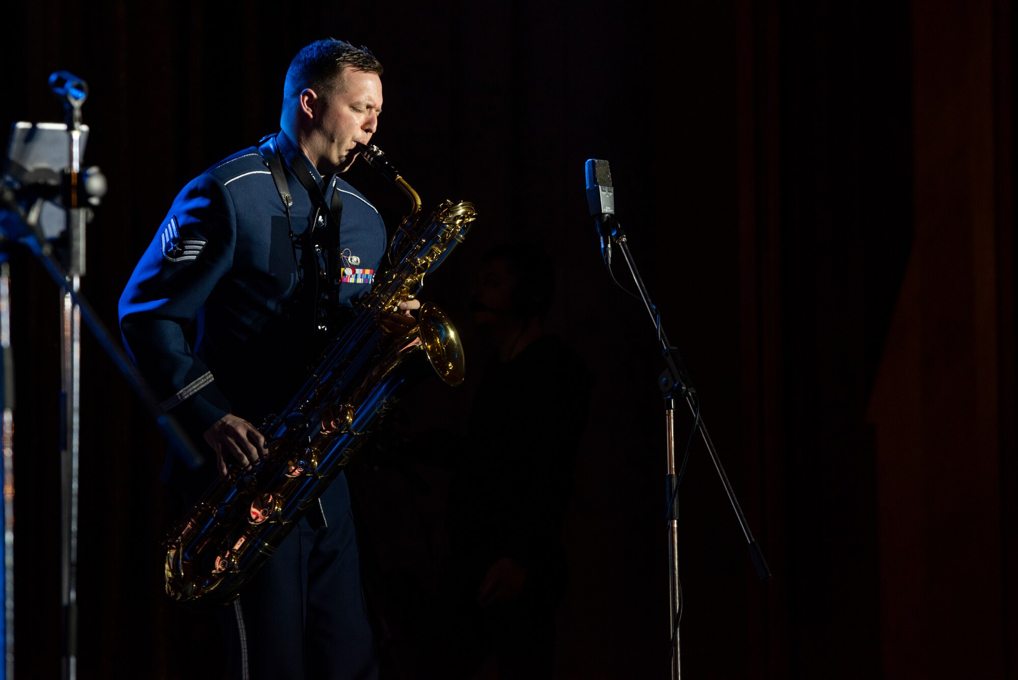 A man plays a saxophone