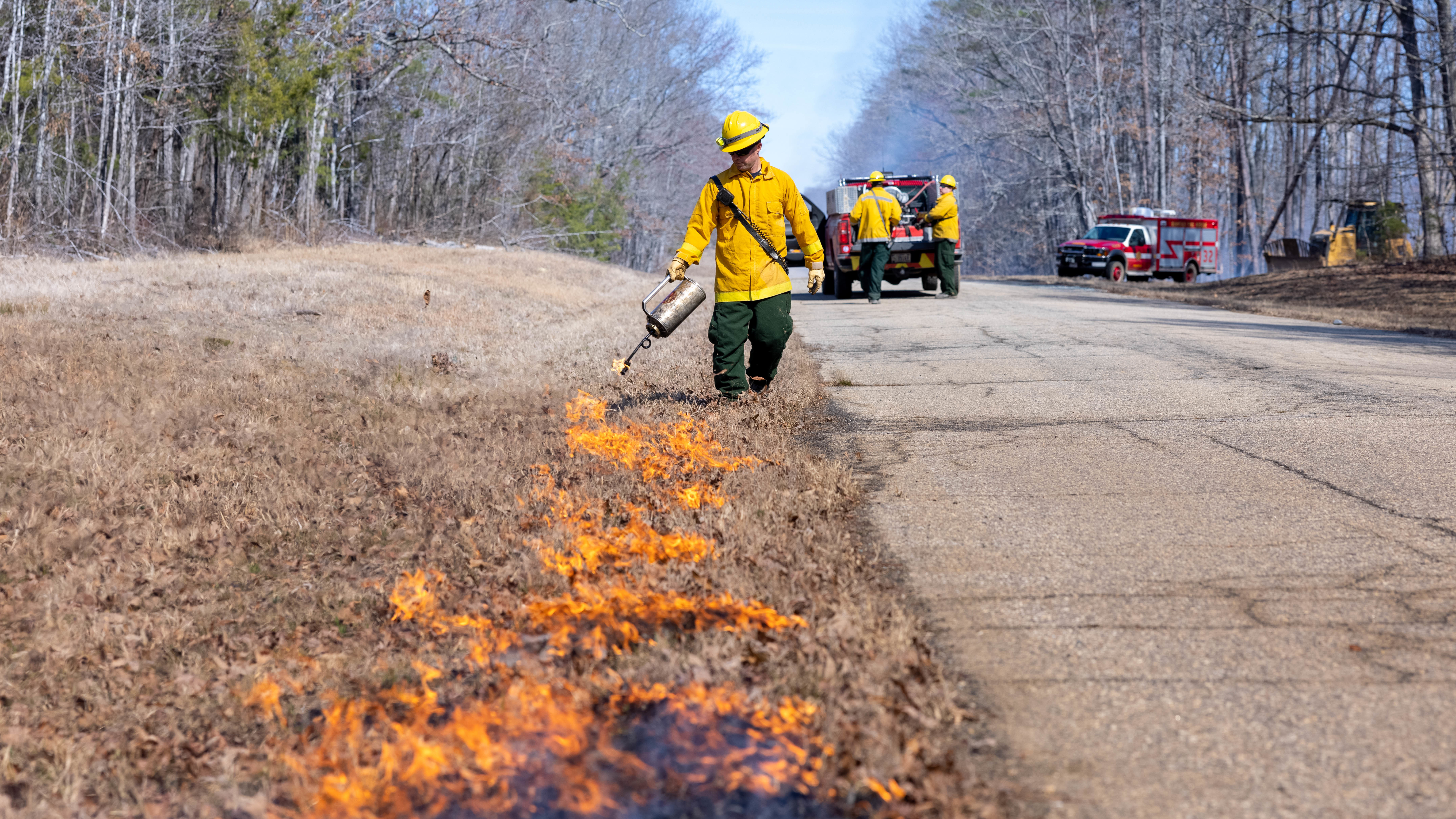 Mark Blake, Quantico Fire & Emergency Services, conducts controlled burns at Marine Corps Base Quantico, Virginia, March 9, 2023. According to the NREA, the purpose of the burns is to reduce fuel litter, minimize the potential of wildfires, and promote wildlife habitat. Fuel litter is dead and trodden woody debris that could be used as fuel for wildfires or other potential hazards.