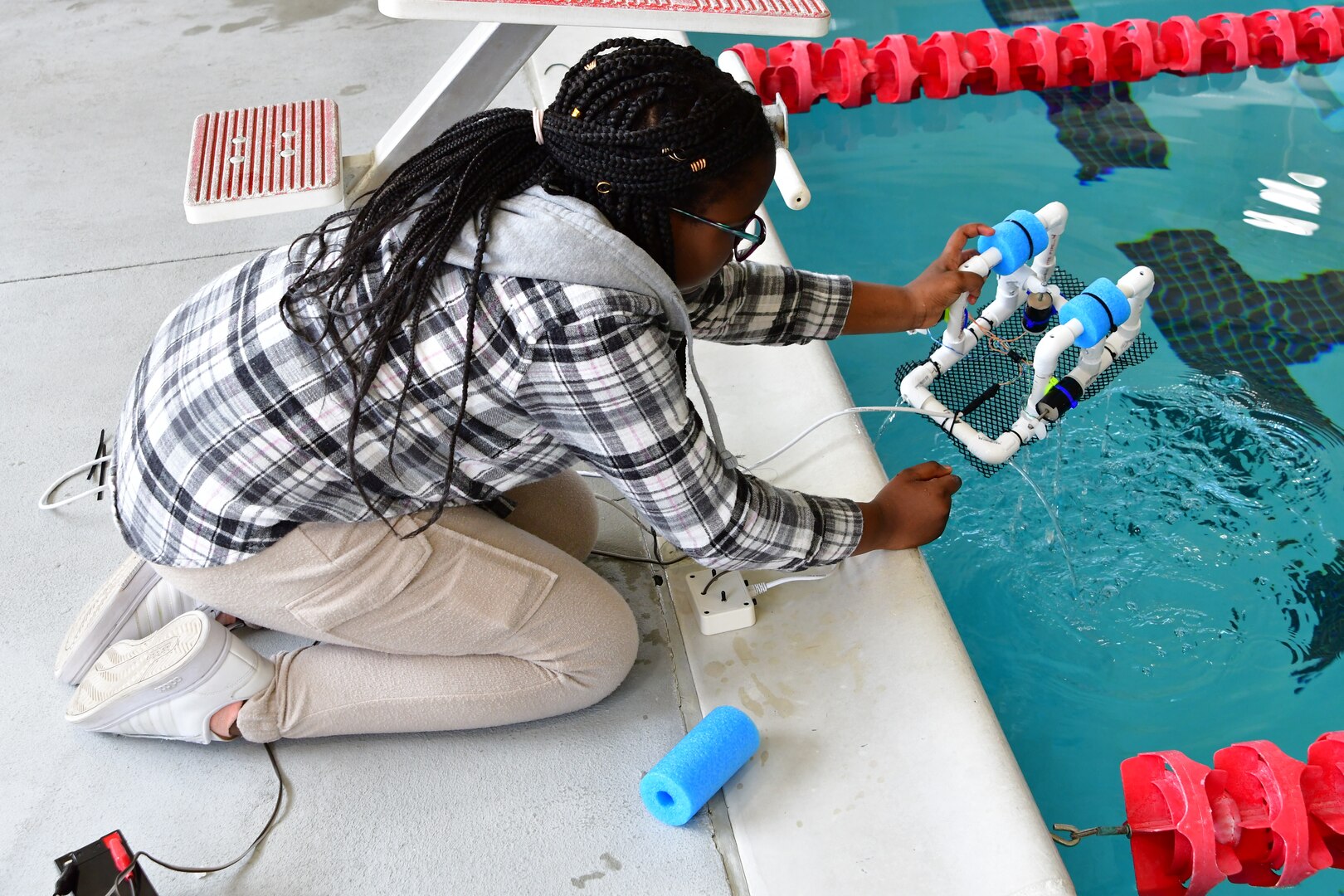 IMAGE: A student participates in the 2023 Naval Surface Warfare Center Division SeaPerch Regional Competition held at the King George YMCA March 18. SeaPerch is an underwater robotics program that enables students to build a remotely operated vehicle.