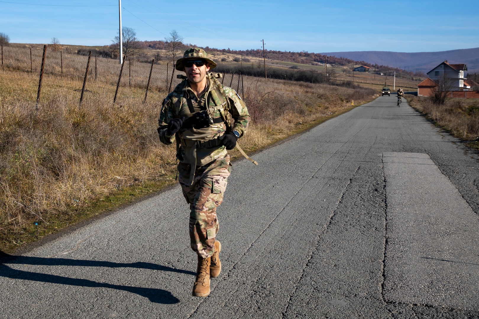 Five hundred and forty-five Soldiers from 21 nations across Kosovo Force Regional Command-East (KFOR RC-E) participate in the traditional Danish Contingency (DANCON) March of 24.27 kilometers near Camp Novo Selo, Kosovo, Jan. 7, 2023.