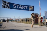 Five hundred and forty-five Soldiers from 21 nations across Kosovo Force Regional Command-East (KFOR RC-E) participate in the traditional Danish Contingency (DANCON) March of 24.27 kilometers near Camp Novo Selo, Kosovo, Jan. 7, 2023. Since 1972, the DANCON March has been conducted wherever Danish soldiers are deployed.  (U.S. Army photos by Staff Sgt. Anna Pongo, 111th Public Affairs Detachment, Nebraska Army National Guard)