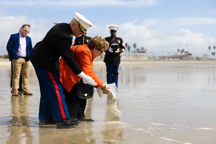 Retired U.S. Marine Col. Willard Buhl and Marisa Borzoni, the life partner of retired Lt. Col. Clark Henry, spread Henry’s ashes as part of his memorial service on Marine Corps Base Camp Pendleton, California, Feb. 21, 2023. Henry enlisted during World War II, received a field commission during the Korean War and received a Silver Star during the Vietnam War. The memorial service included a tour of the 1st Marine Division command post and a tour of Camp Pendleton’s Landing Vehicle Tracked Museum.\