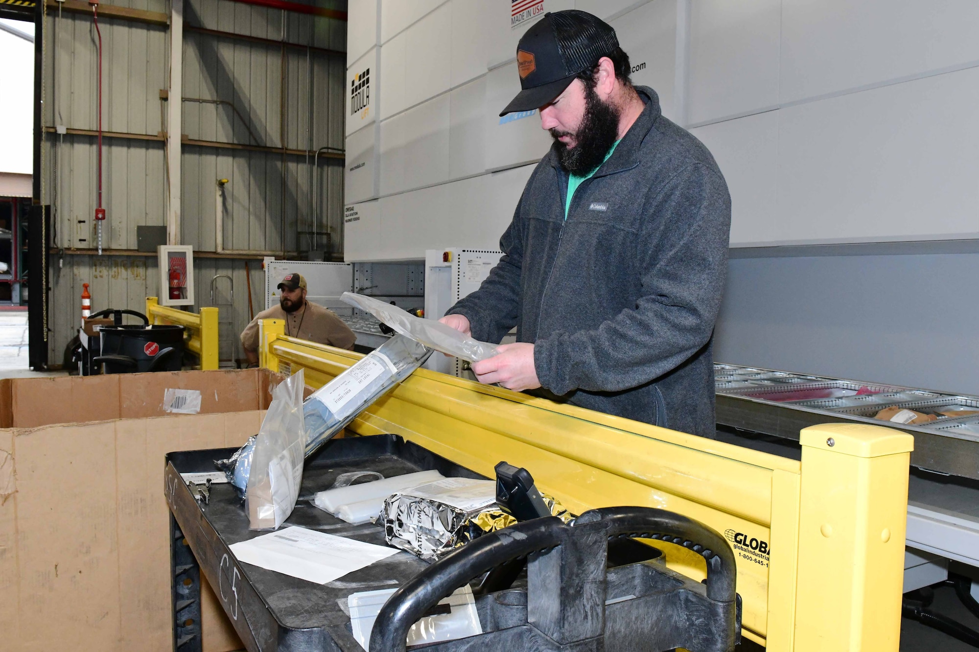 Man processing supplies