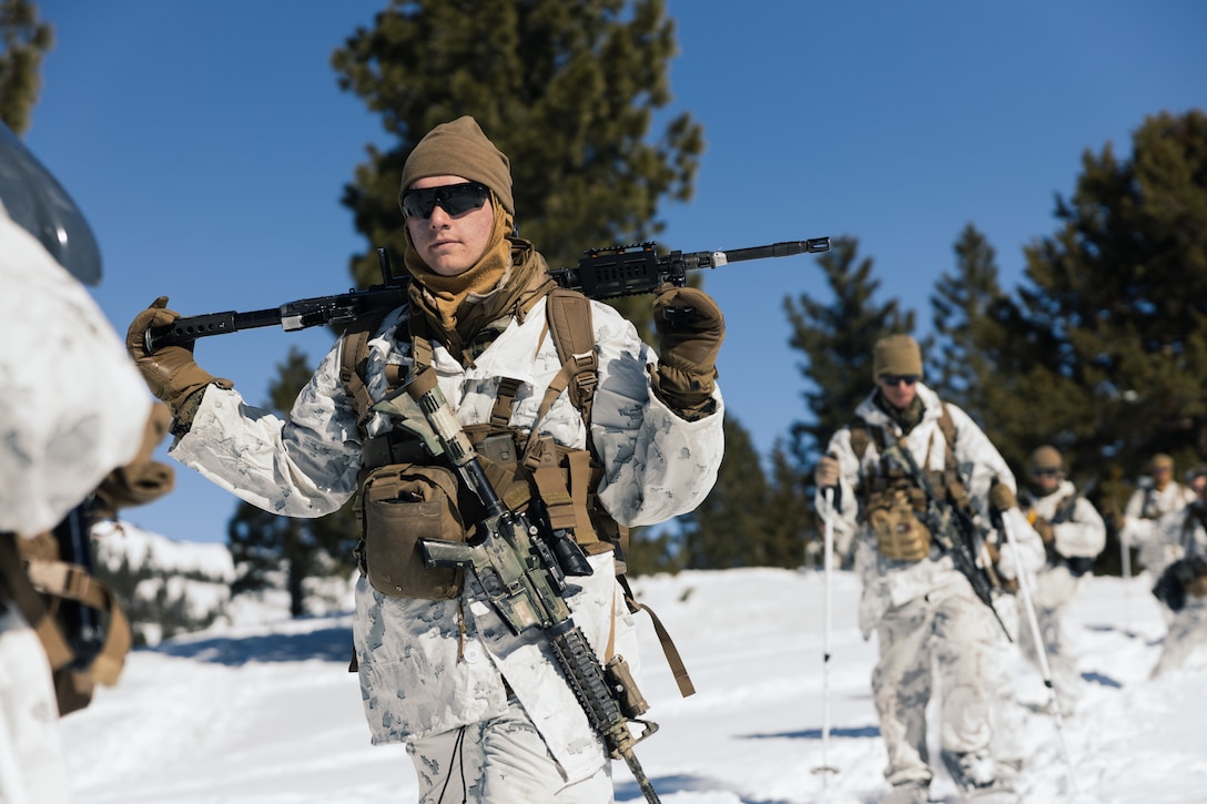 U.S. Marines with 2nd Battalion, 8th Marine Regiment, 2nd Marine Division, hike during Mountain Warfare Training Exercise (MTX) 2-23 at Marine Corps Mountain Warfare Training Center, Bridgeport, California, Jan. 28, 2023. MTX, the first training evolution of Service Level Training Exercise 2-23, teaches Marines how to survive and operate in mountainous environments. (U.S. Marine Corps photo by Cpl. Andrew Bray)