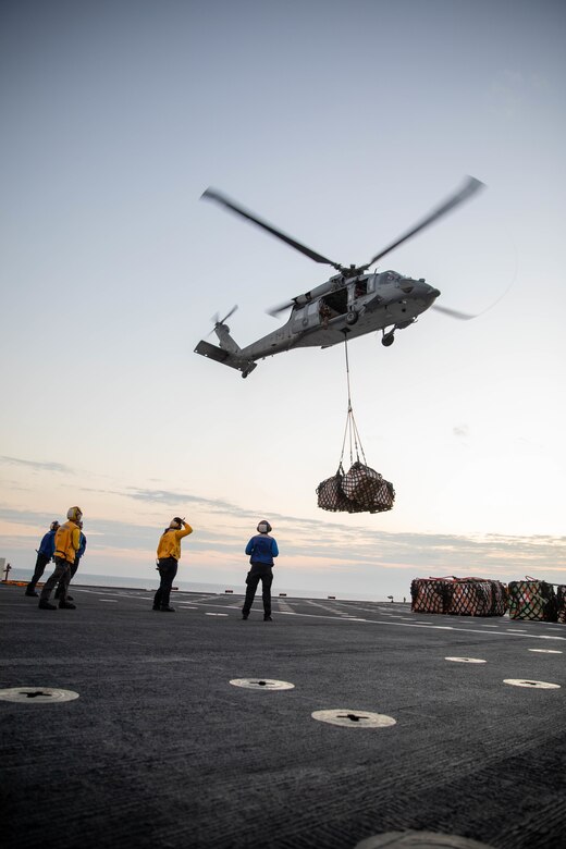 A helicopter delivers supplies.