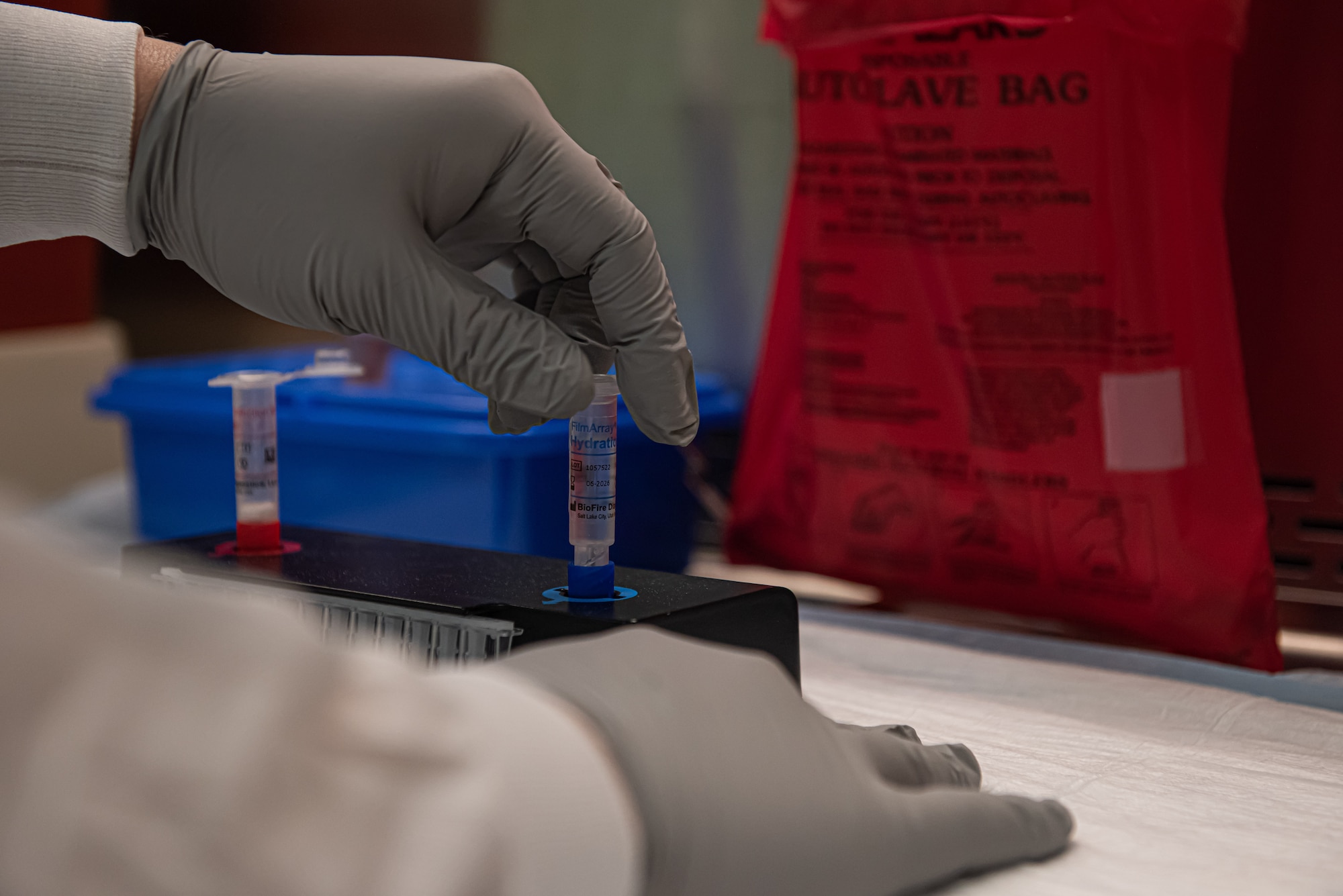 Airman is preparing a rapid covid-19 test.