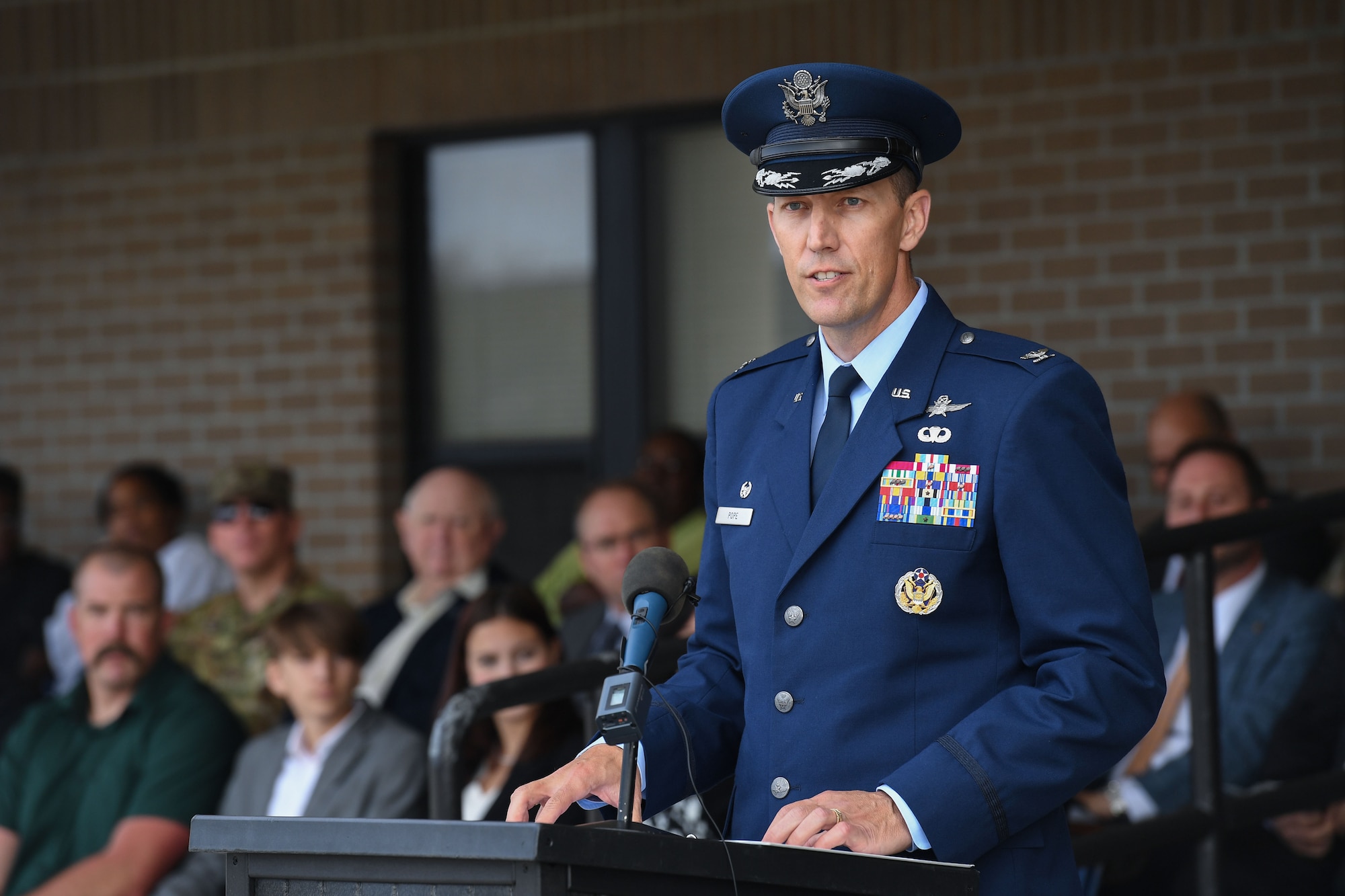 U.S. Air Force Col. Billy Pope, 81st Training Wing commander, delivers remarks during an assumption of command ceremony on the Levitow Training Support Facility drill pad at Keesler Air Force Base, Mississippi, March 23, 2023.