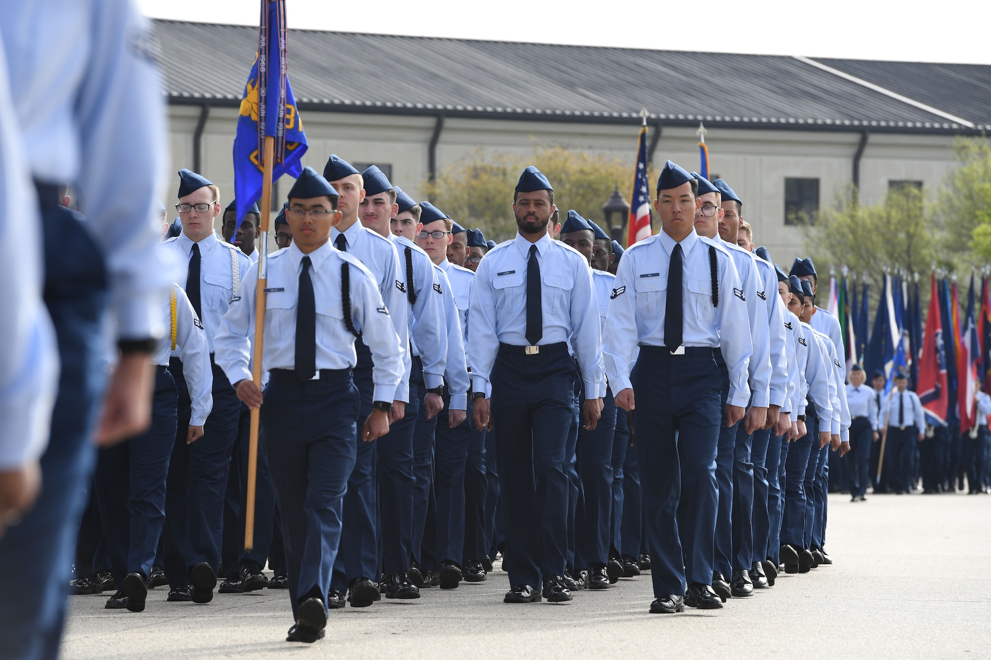 Airmen from the 81st Training Group march in formation  during the 81st Training Wing assumption of command ceremony on the Levitow Training Support Facility drill pad at Keesler Air Force Base, Mississippi, March 23, 2023.