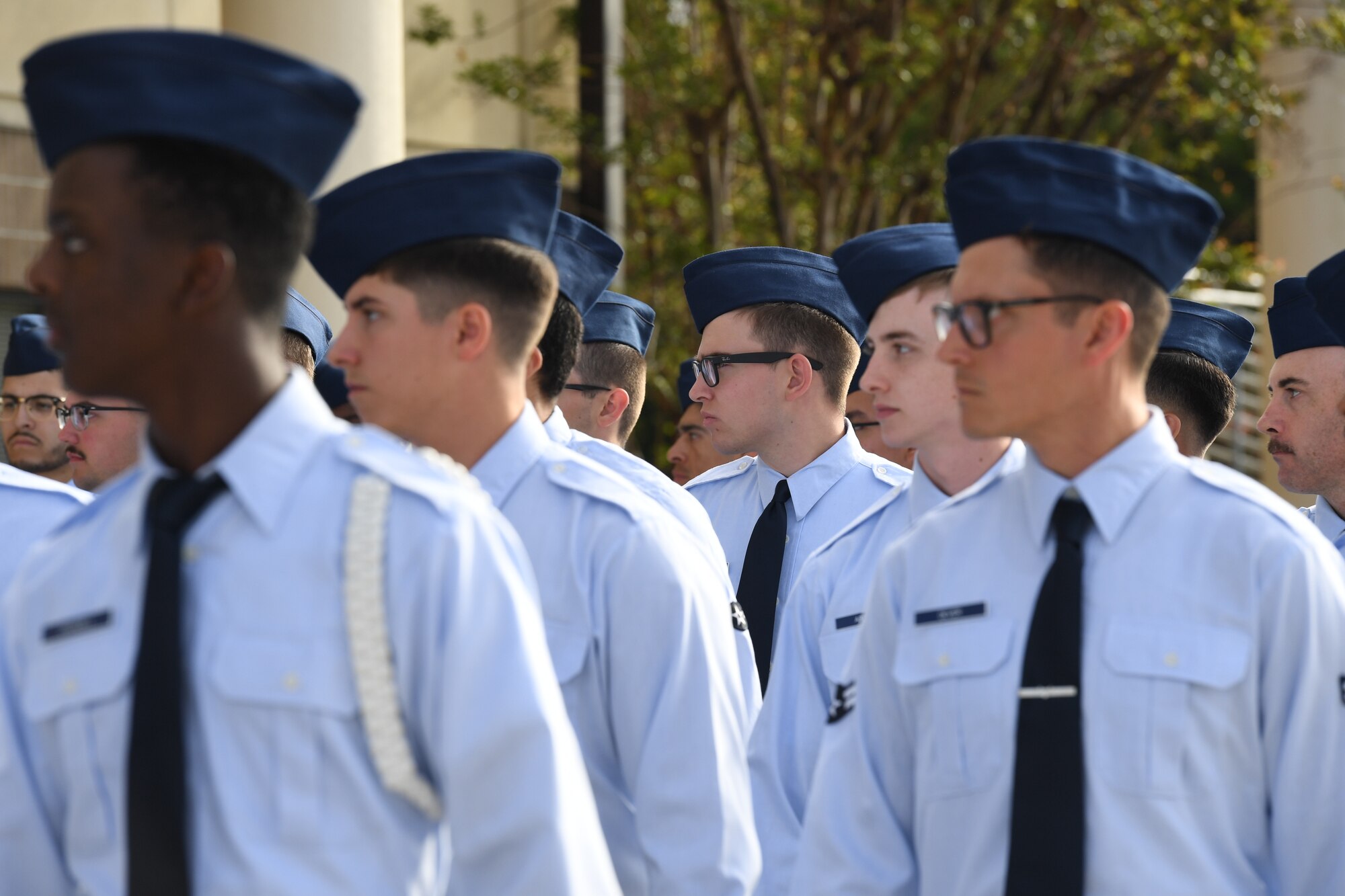Airmen from the 81st Training Group march in formation  during the 81st Training Wing assumption of command ceremony on the Levitow Training Support Facility drill pad at Keesler Air Force Base, Mississippi, March 23, 2023.
