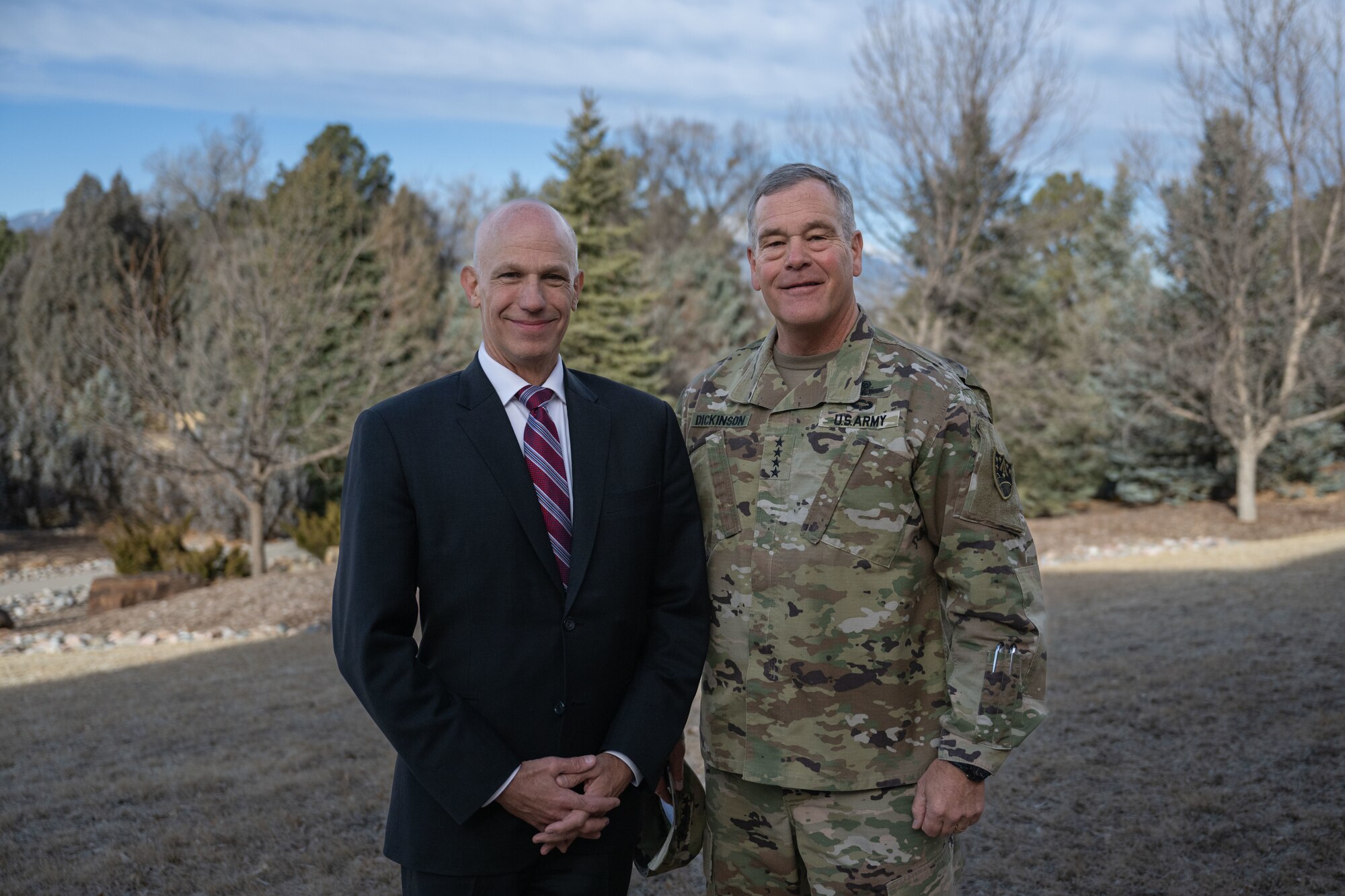 U.S. Army Gen. James Dickinson, U.S. Space Command commander, poses with Dr. James Baker, Office of Net Assessment director, on day one of USSPACECOM’s 2023 Spring Commander’s Conference at Peterson Space Force Base, Colo., March 14, 2023. Dr. Baker spoke to more than 70 senior leaders during the three-day conference concerning the current strategic environment and the implication of space operations and warfare in the space domain. (USSPACECOM Photo by John Ayre)