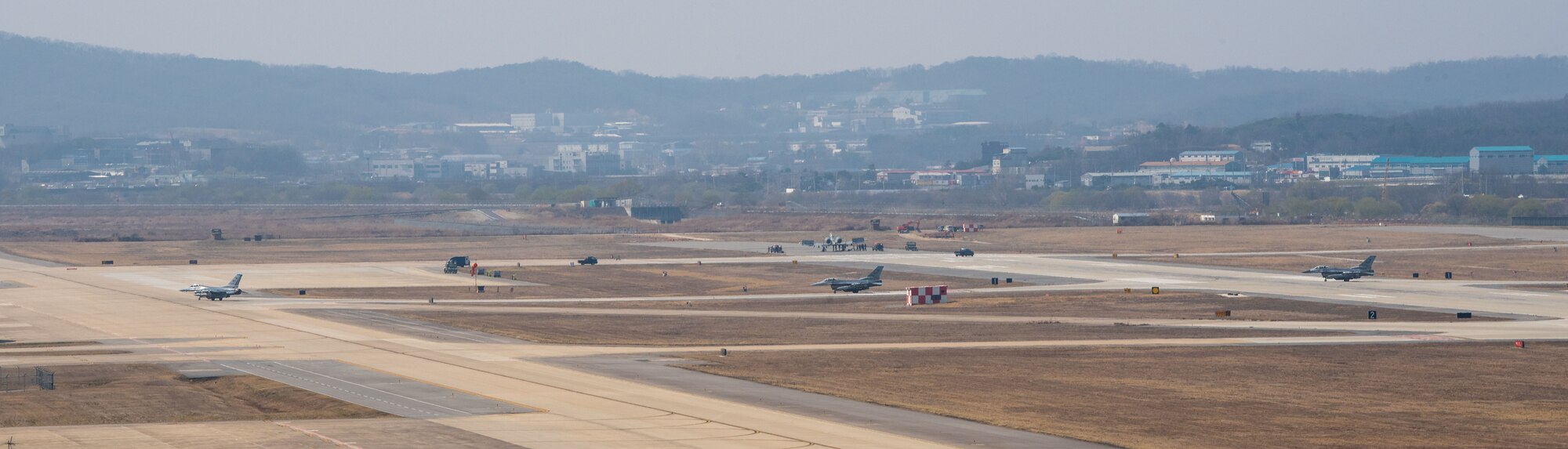 Photo of Airmen, F-16s landing at Osan
