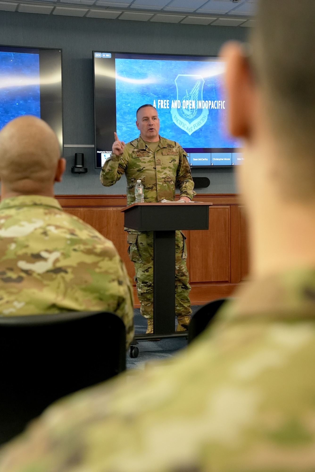 Chief Master Sgt. David R. Wolfe briefs Airmen on the state of the Pacific Region at Kessel Run’s office here, March 20, 2023. Wolfe’s visit also focused on learning more about Kessel Run’s applications. Wolfe is the command chief master sergeant for Pacific Air Forces, Joint Base Pearl Harbor-Hickam, Hawaii. (U.S. Air Force photo by Richard Blumenstein)